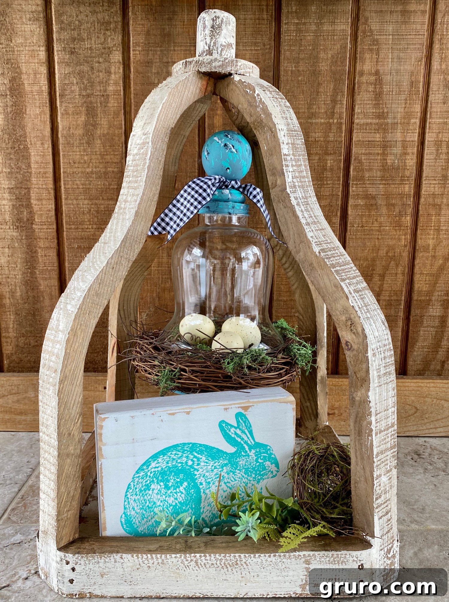 Another view of the completed DIY spring cloche, ready for home display