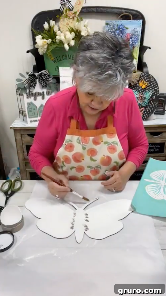 Applying grey paint for a blended butterfly body