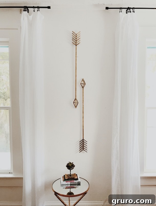 Chic modern farmhouse bedroom with neutral walls and rustic wooden accents