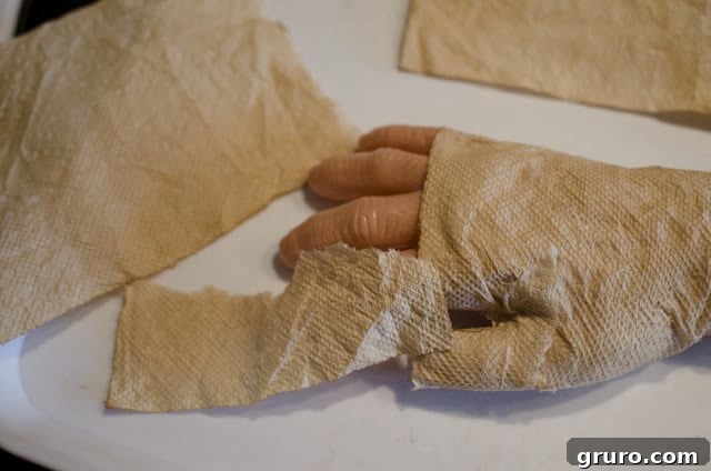 The Embalmed Hand Artifact 4 Wrapping the mummy hand with paper towels