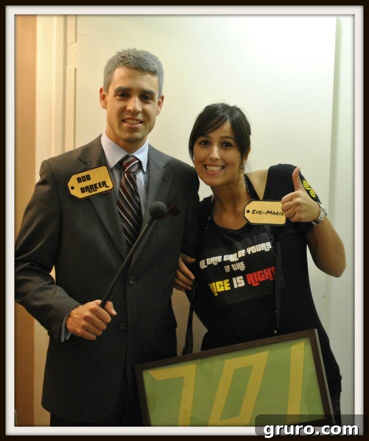 A couple dressed as the host and a contestant from 'The Price is Right' game show, a fun and interactive costume.