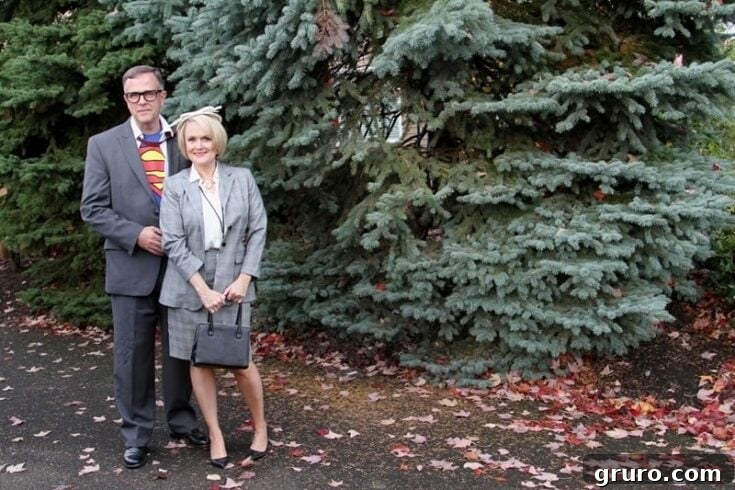 A couple dressed as Clark Kent and Lois Lane, featuring Clark's iconic suit with a Superman reveal underneath.