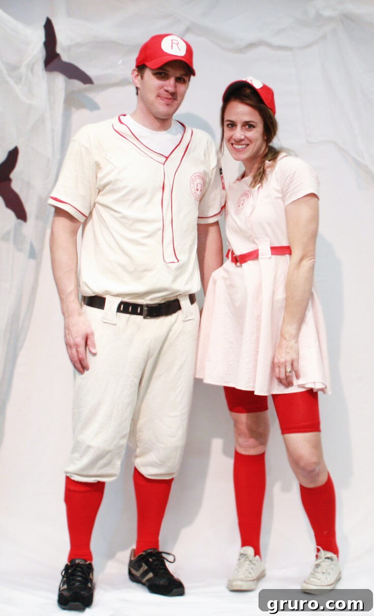A couple dressed in 'A League of Their Own' team costumes, representing the trailblazing women of the Rockford Peaches.