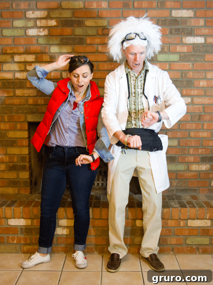 A couple dressed as Marty McFly and Doc Brown from Back to the Future, complete with iconic 80s outfits and props.