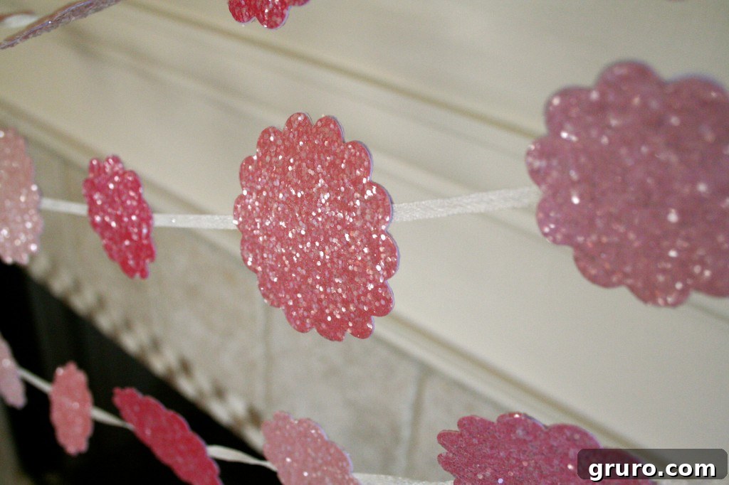 Close-up of a pink and sparkling Valentine's Day banner on a mantel