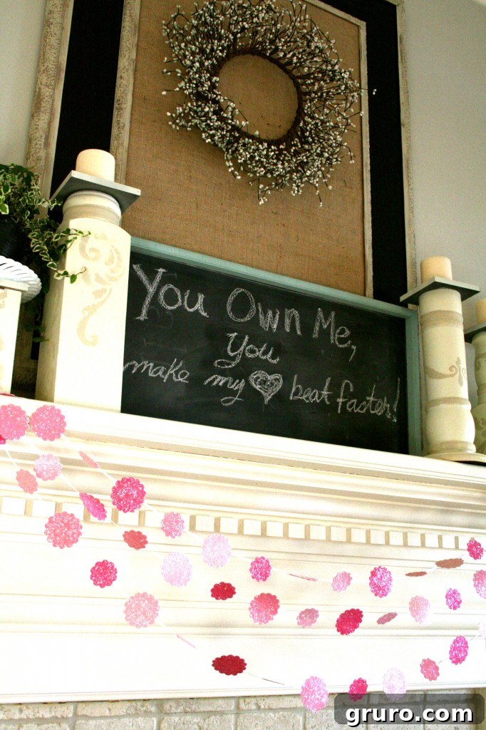 Detailed shot of Valentine's Day mantel decor, highlighting various accents