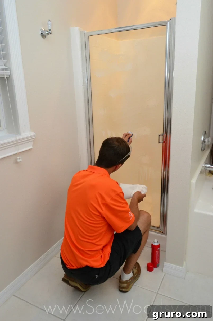 Completed shower door with elegant textured privacy film