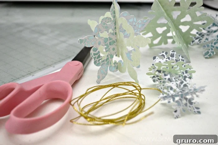 Securing Die-Cut Snowflakes with adhesive