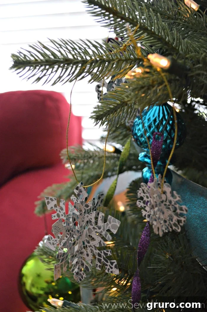 Handmade Die-Cut Snowflake Ornaments on Christmas tree