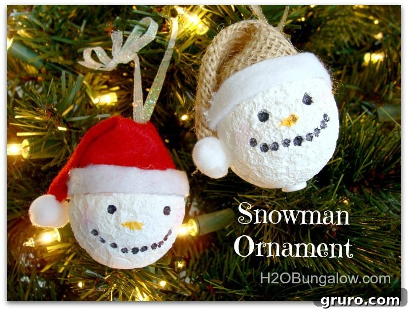 Handmade Snowman Ornament featuring a red hat, perfect for Christmas tree decor.