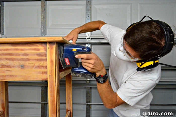Using an Orbital Sander Between Grooves to Remove Old Stain