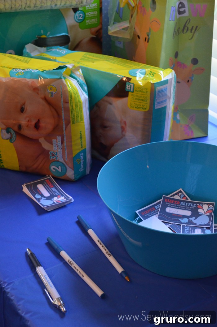 Diaper raffle tickets and sign for baby shower