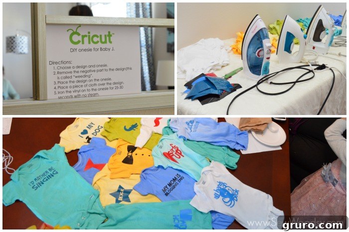 Cricut iron-on vinyl onesie decorating station at a baby shower