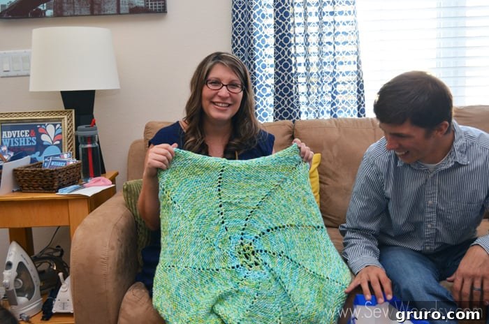 Hand-knitted baby blanket in shades of blue