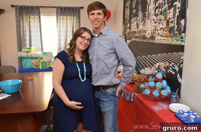 Happy couple at the end of their baby shower