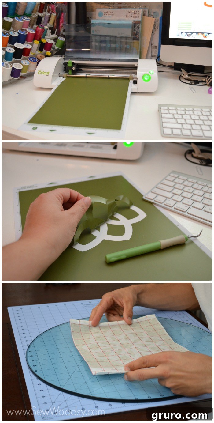 Applying a vinyl floral stencil to the center of a clean glass tabletop