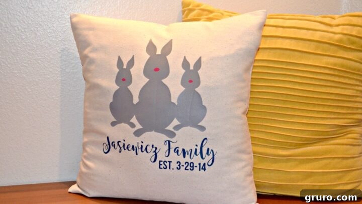 A cozy pillow featuring a white bunny family silhouette against a pastel background, perfect for Easter decor.