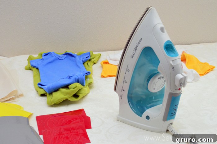 Baby Shower Onesie Station with various onesies and designs