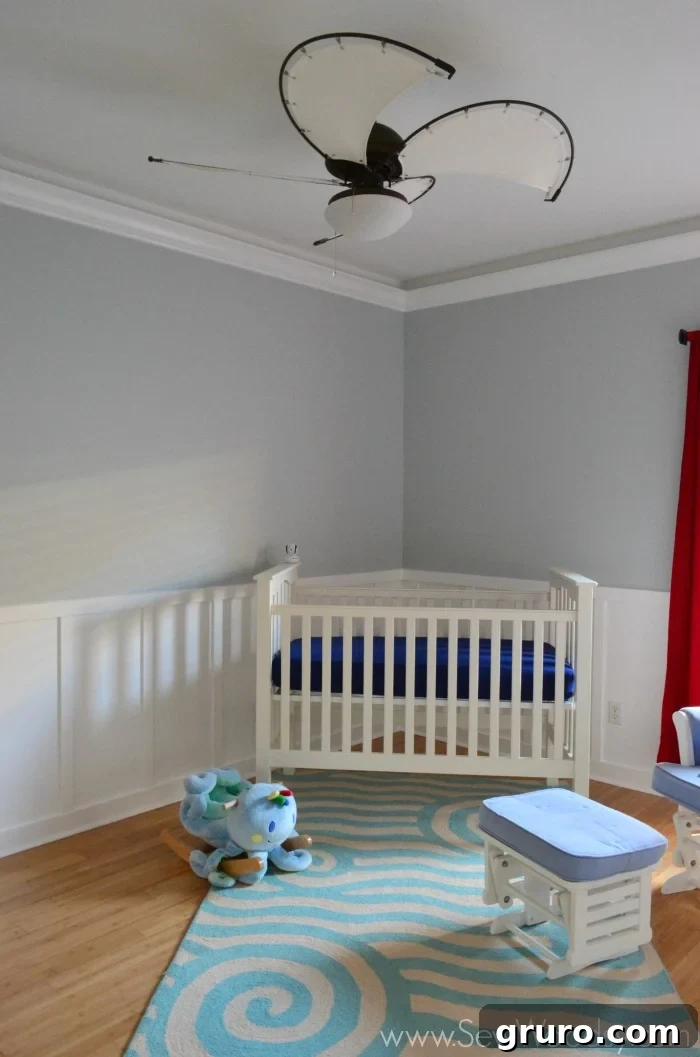 Ceiling Fan Installation: From Box to Breeze 11 A beautiful view of the newly installed LampsPlus ceiling fan, adding comfort to the nursery.
