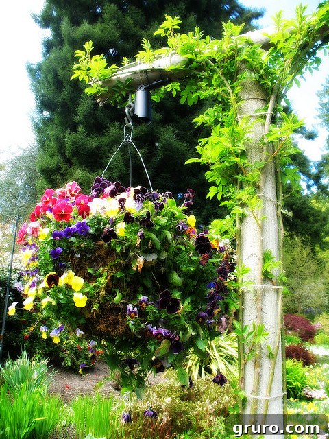 A lush, overflowing DIY hanging flower basket, filled with vibrant blossoms, a beautiful addition to any garden or patio.