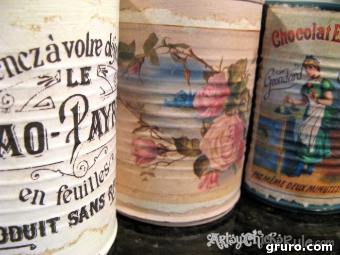 Decorated tin cans, transformed into charming storage or decorative items, showcasing simple yet effective crafting techniques.