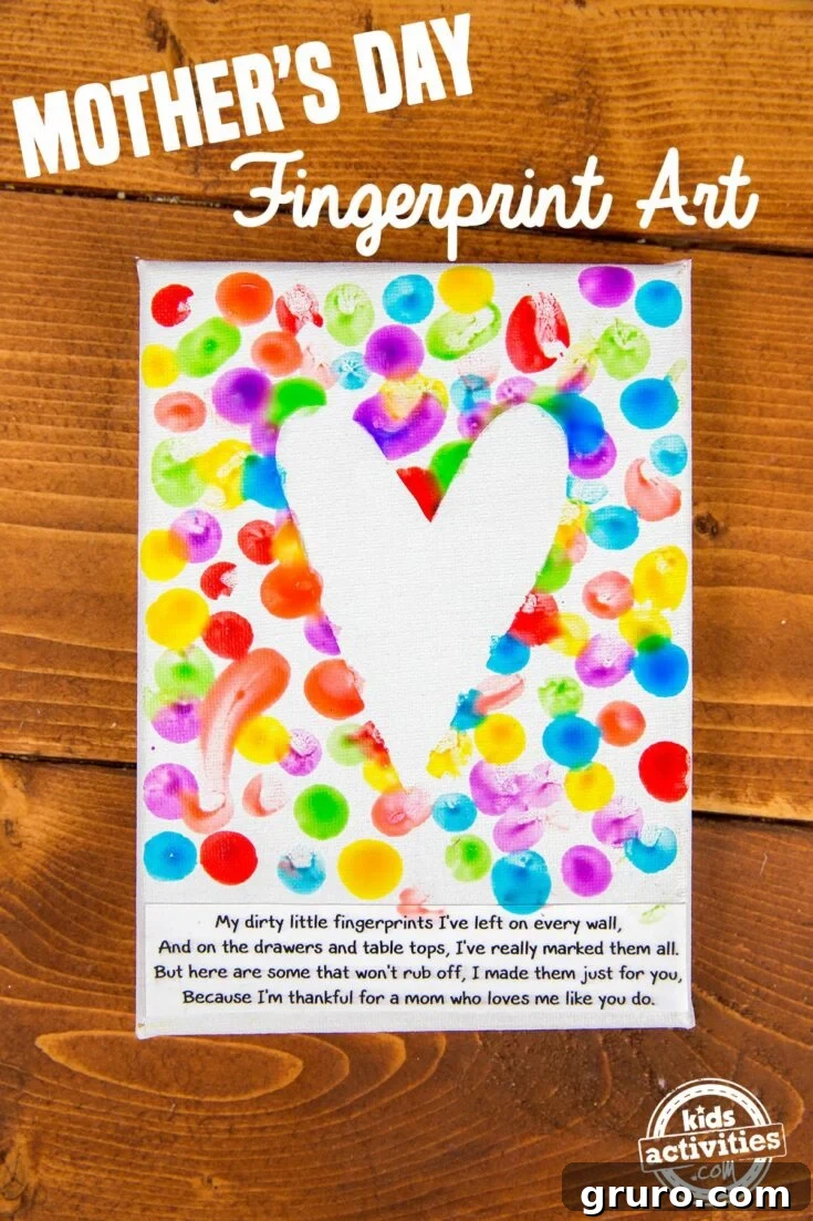 A charming piece of fingerprint art, possibly depicting a tree with colorful fingerprint leaves or other creative designs, for Mother's Day.