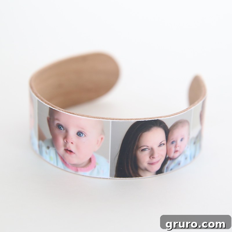 A creative DIY popsicle stick photo bracelet, intricately decorated with small photos, a charming and sentimental wearable gift for Mom.