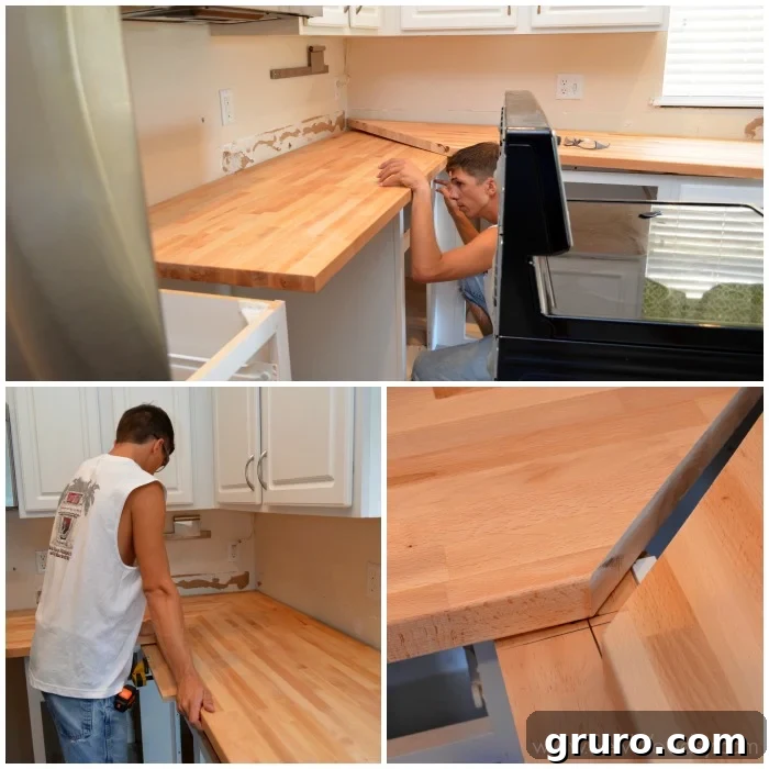 A close-up shot of a man installing butcher block countertops, focusing on the corner joint where two sections meet.