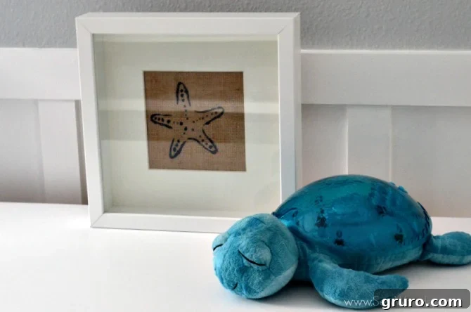 Rustic Sea Star Craft 11 The final step of assembling the frame with the taped burlap starfish art, showcasing how easy it is to create custom DIY nautical decor in under 30 minutes.