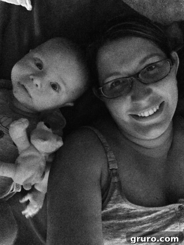 A grainy but heartfelt selfie of mom and baby Ryder, capturing an everyday moment