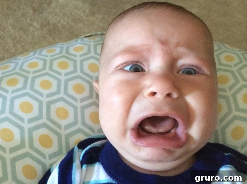 Baby Ryder's dramatic sad face caught mid-reaction, a humorous moment illustrating baby emotions