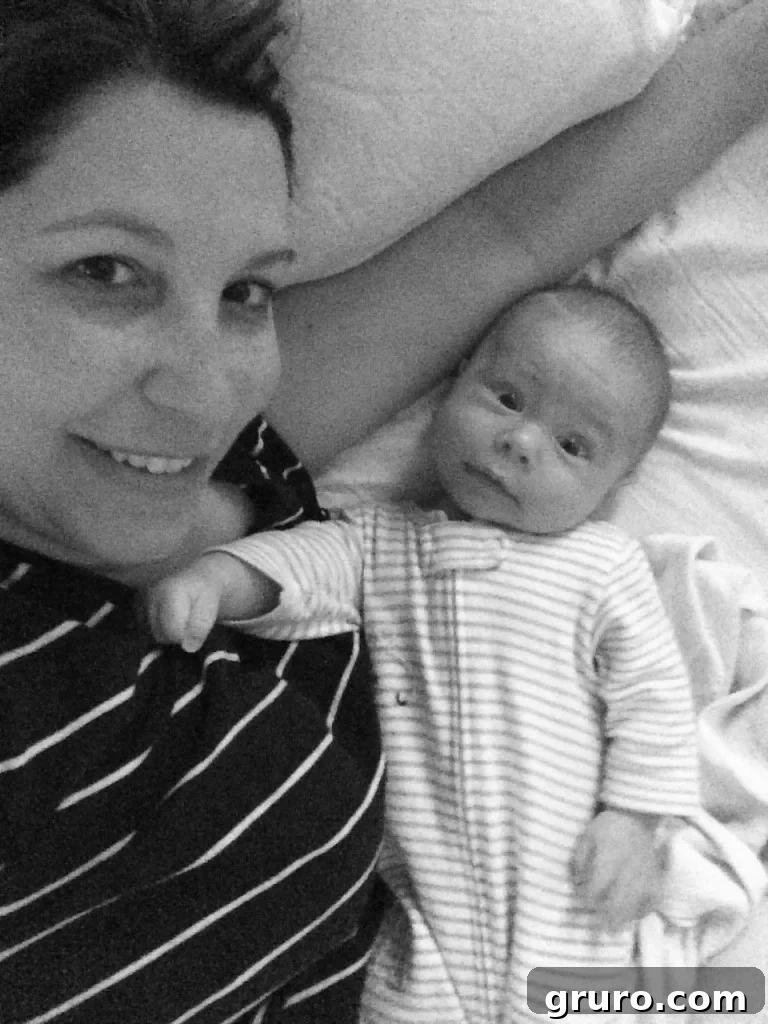 Ryder in his pajamas on July 1st, showing how much he has grown in just one month
