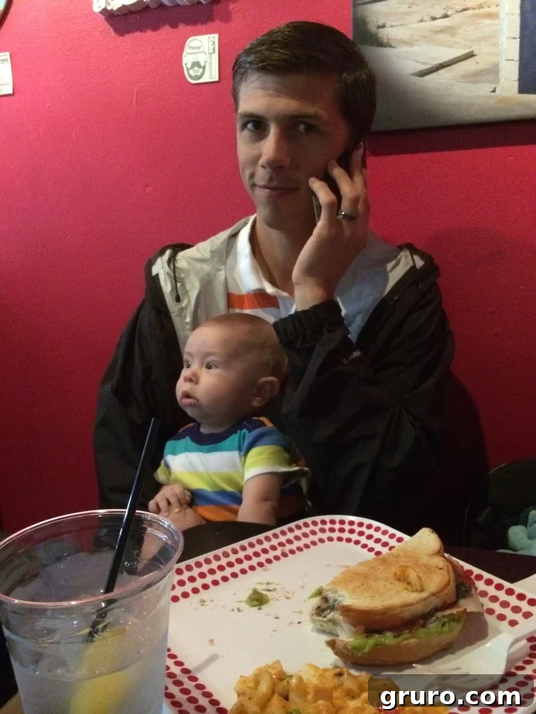 Proud parents Jon and baby Ryder enjoying lunch after a successful doctor's visit and vaccinations