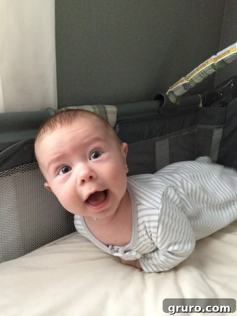 Ryder enthusiastically enjoying tummy time and demonstrating his rolling over milestone