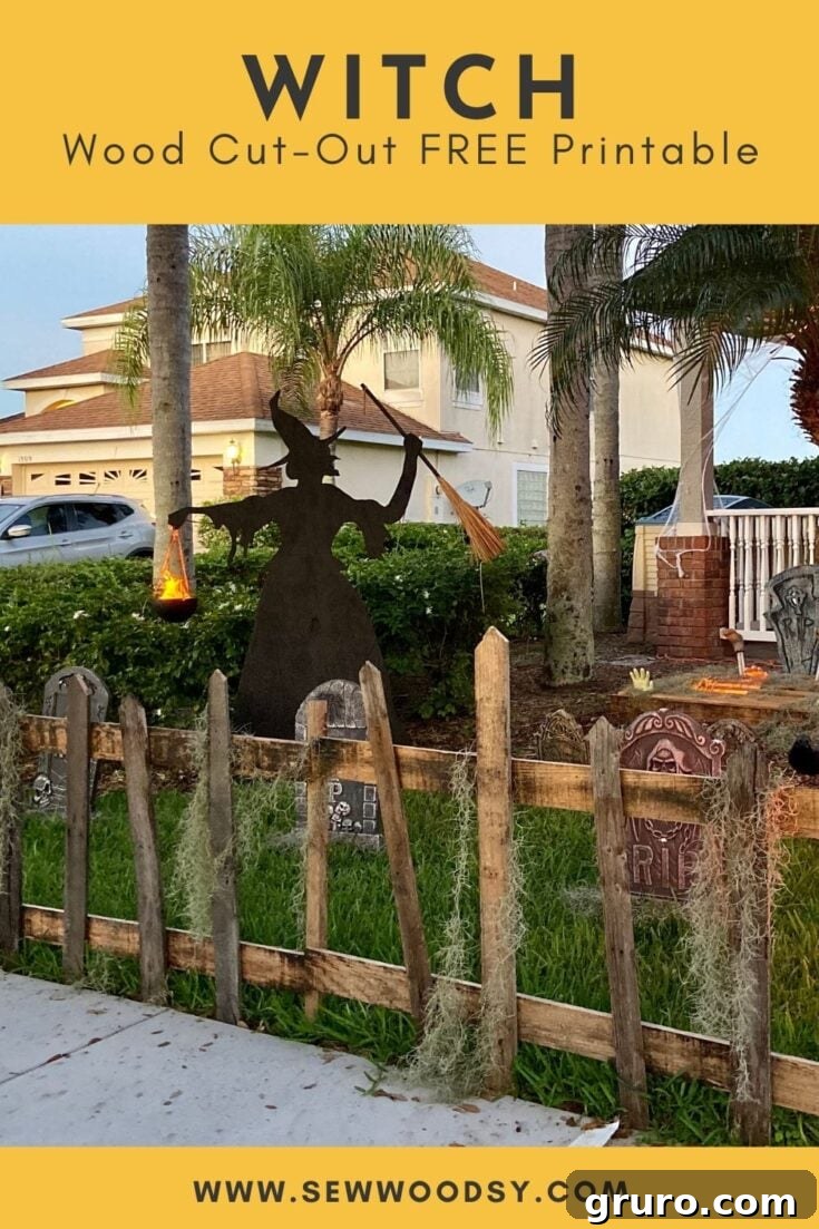 A witch wood cut-out silhouette standing in a yard, with a full moon in the background, making an inexpensive Halloween decoration.