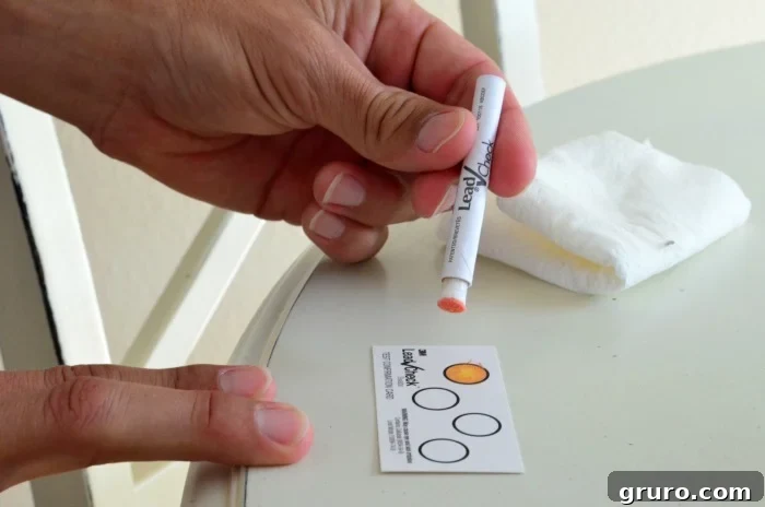 LeadCheck 7: A 3M LeadCheck Swab showing a positive (red) result for lead paint.