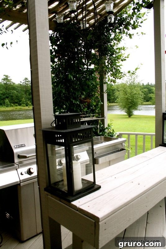 Evening shot of a back porch illuminated by candlelight, creating a tranquil and inviting ambiance for relaxation.