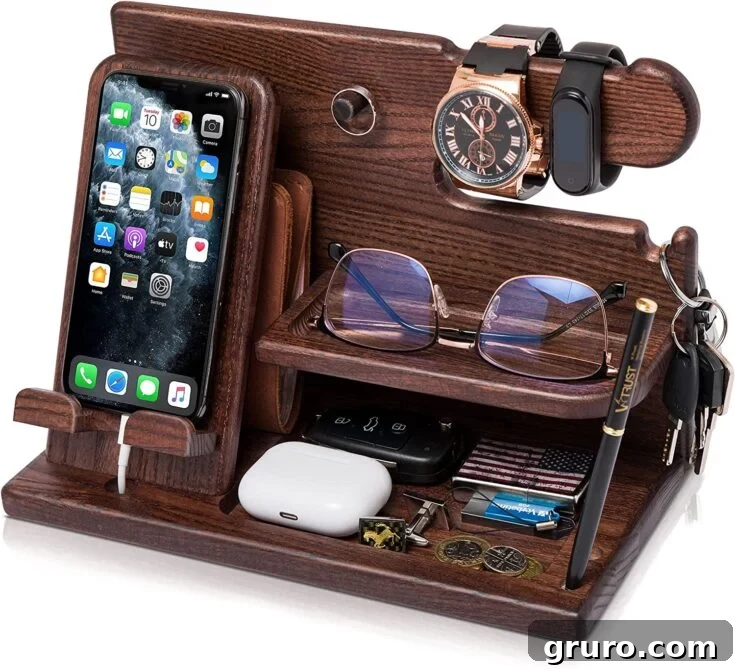 A wooden phone docking station holding a phone, watch, and wallet