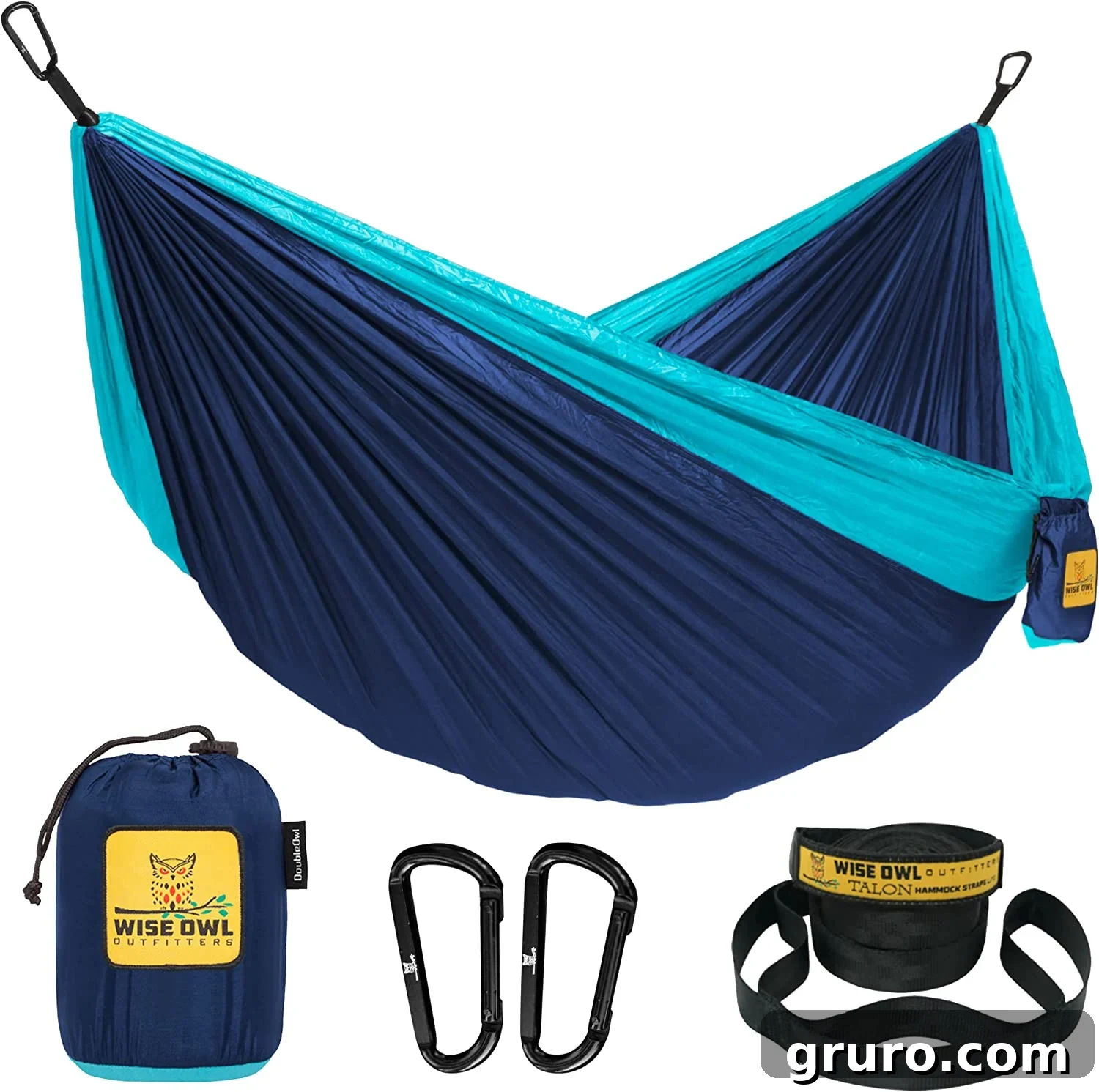 A portable hammock suspended between trees in a forest setting