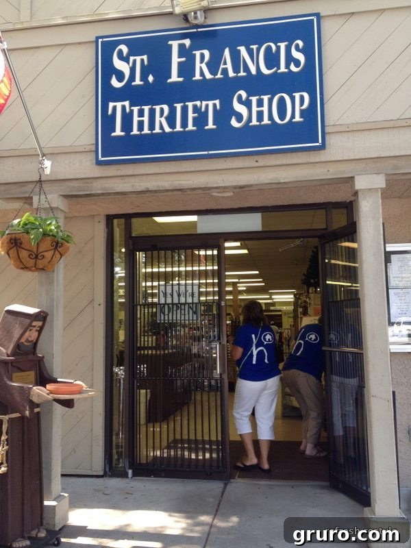 Group of women standing outside a thrift store, some with Hometalk t-shirts