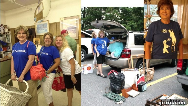 Two women sorting through thrifted items in the back of an SUV
