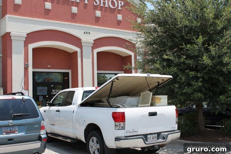 Loading the Truck Truck loaded with furniture and decor items for delivery to the warehouse