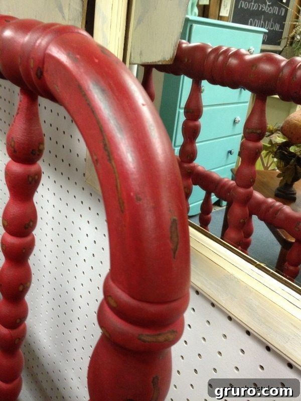 Applying wax to Miss Mustard Seed Tricycle Red furniture