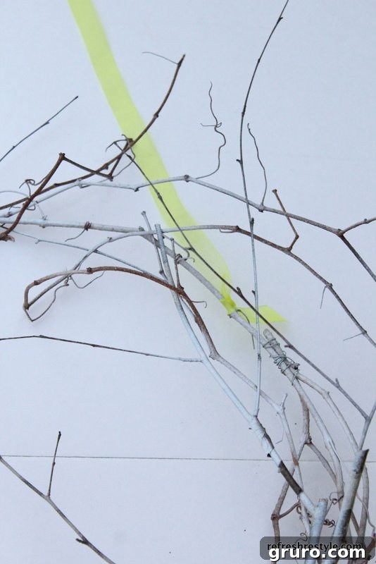 Detailed shot of the white wreath, showing leaf veins artfully drawn back with a black Sharpie.