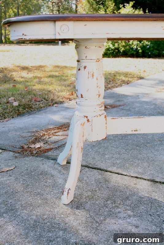 Make over an old oak sofa table with Miss Mustard Seed Milk Paint, showing the distressed finish