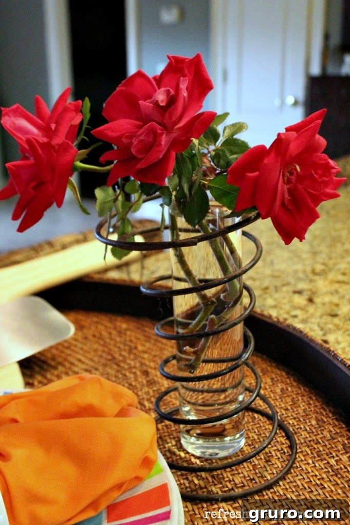 Flame-Kissed Pizza 2 Intimate close-up of a table setting with candles and flowers for a date night