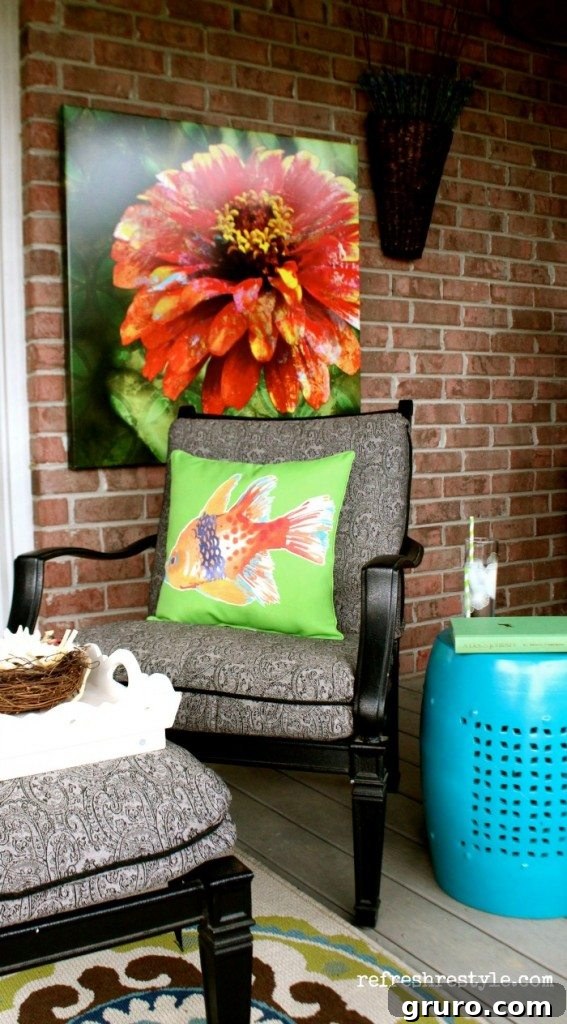 Stylish outdoor pillow with a unique art print, adding personality to the deck