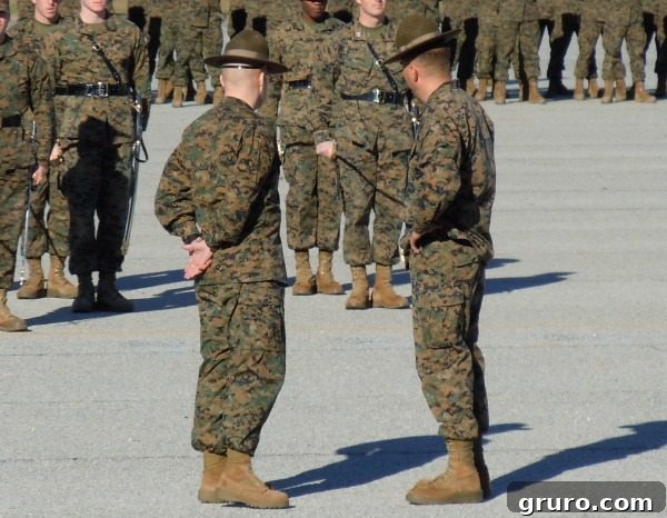 Marine Mitchell in uniform, resting and reflecting, highlighting the human side of military service.