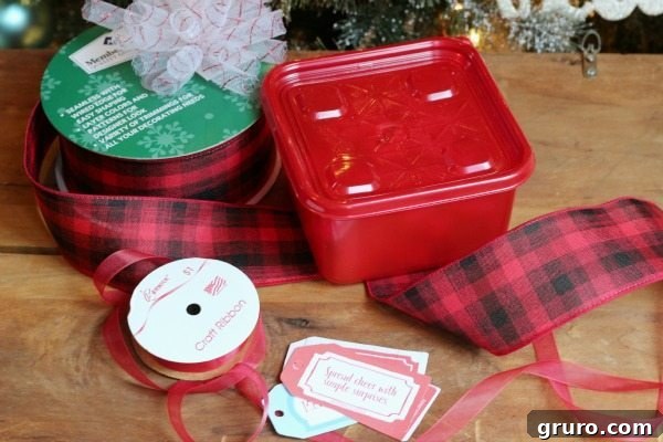 Ultimate Christmas Cookie Giveaway 8 Ziploc containers used for Christmas goodies to stay fresh, with ribbon and gift tag for giving