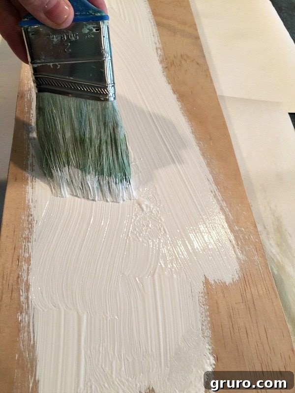Paint your board with craft paint or chalk paint let it dry and create your farmhouse sign